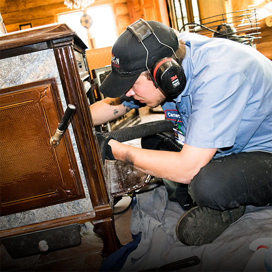 Original Photo-Technician Fixing Fireplace- Mountain Man Fireplace & Chimney Technician working on fireplace